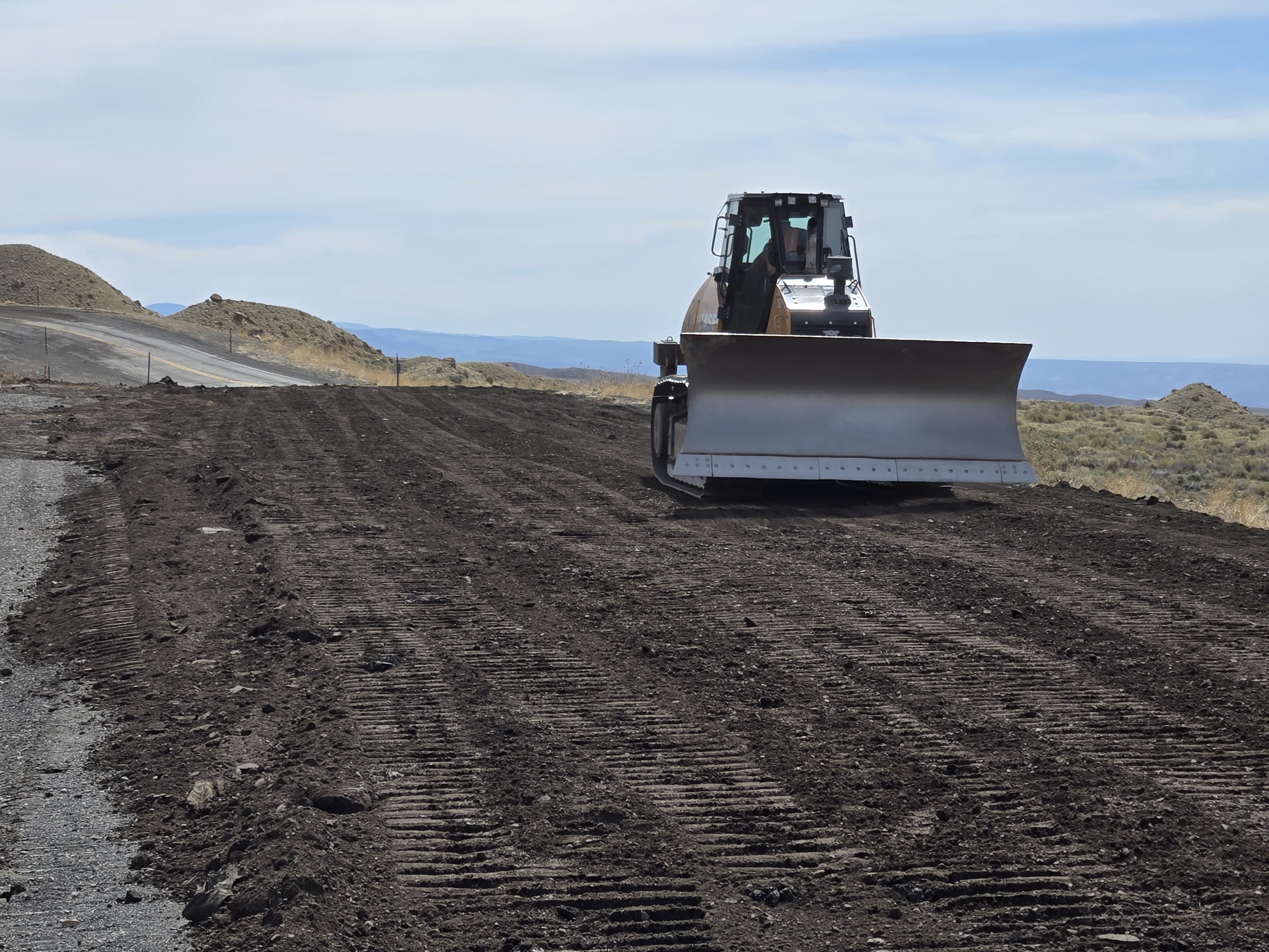 Photo shows slide repair efforts on US14A in April.